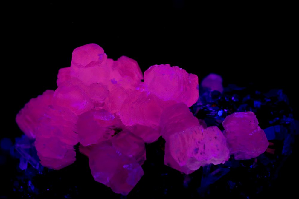 Why Does Calcite Fluoresce